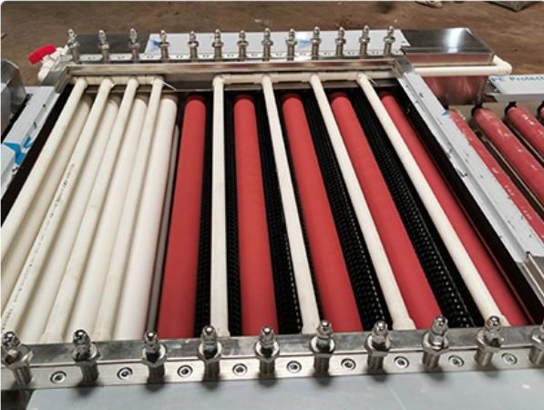Brush rollers for glass processing